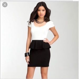 Bebe dress. Peplum style XS